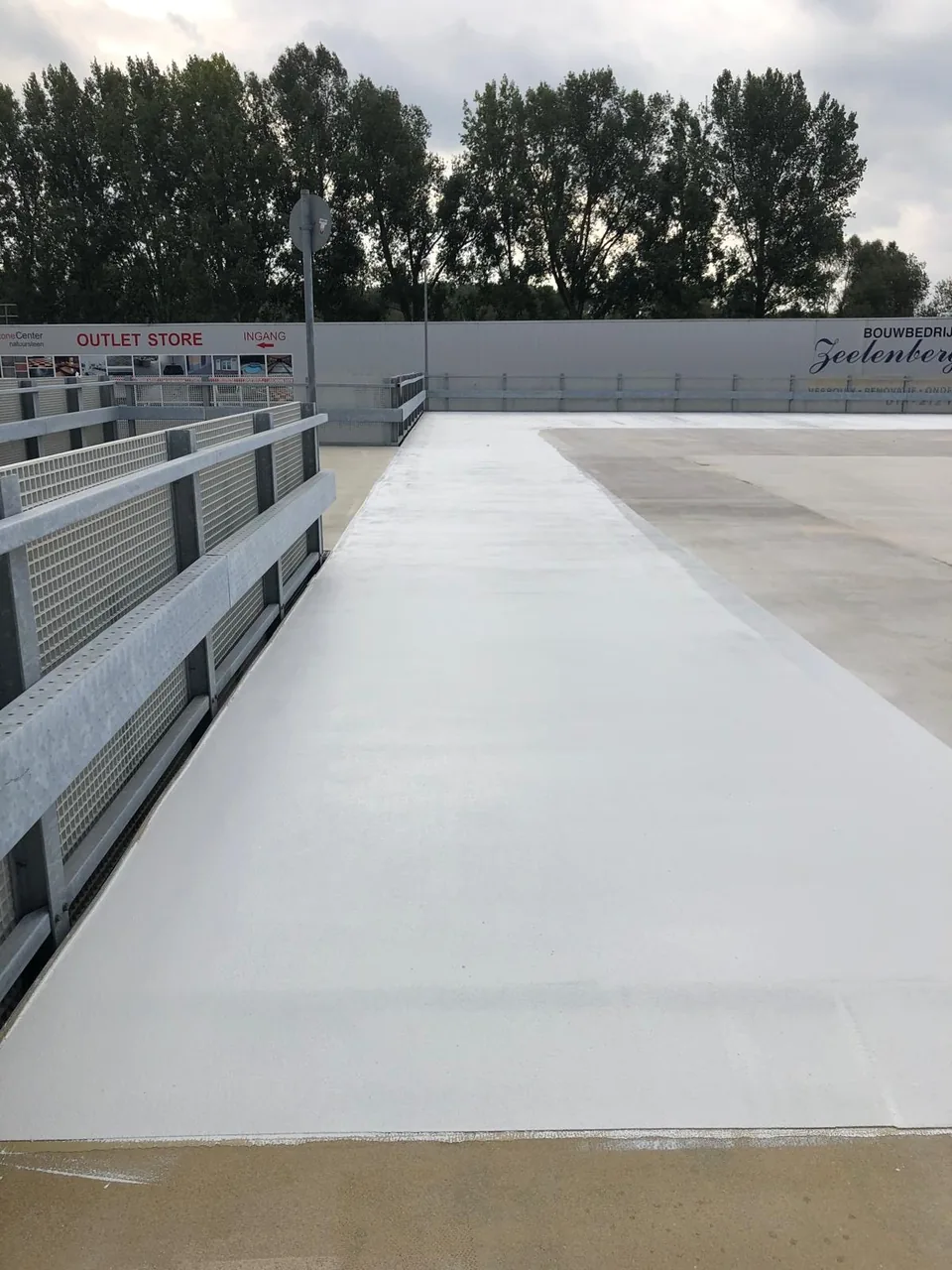 Light grey Comforpark Deck on an open rooftop car park after application
