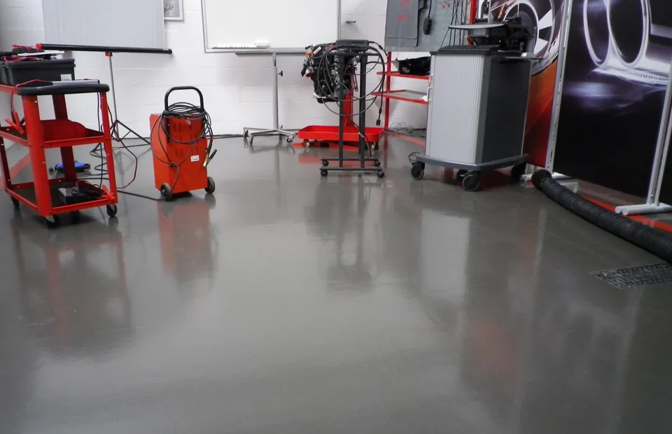 Grey Sika Ucrete MF floor in a workshop with tool trolleys